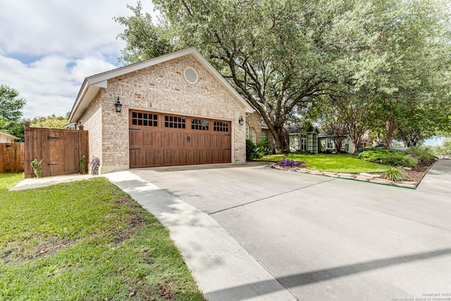 6502 Amber Oak, San Antonio, TX 78249 - view of front of house featuring brick siding, concrete driveway, and an attached garage