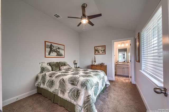 14815 Highdere, San Antonio, TX 78245 - bedroom featuring light colored carpet, lofted ceiling, baseboards, and connected bathroom