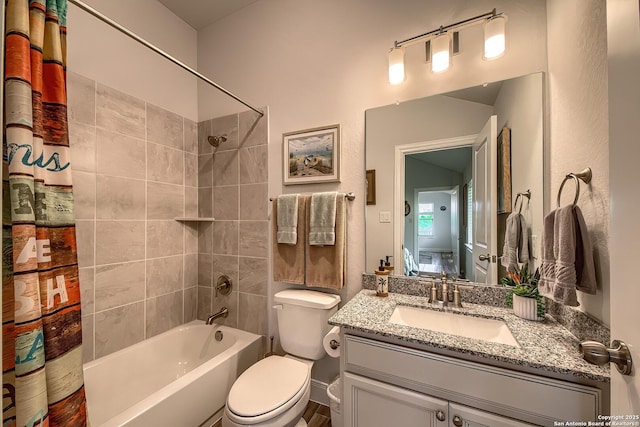 14815 Highdere, San Antonio, TX 78245 - bathroom with shower / bath combo with shower curtain, vanity, and toilet