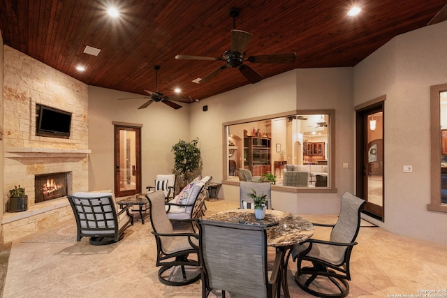 208 Cascade Caverns, Boerne, TX 78015 - view of patio / terrace featuring ceiling fan, outdoor dining area, and an outdoor living space with a fireplace