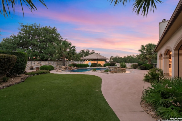 208 Cascade Caverns, Boerne, TX 78015 - view of green lawn featuring a gazebo and a patio