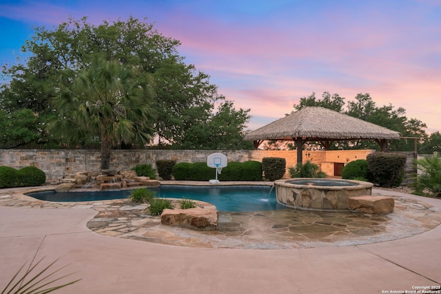 208 Cascade Caverns, Boerne, TX 78015 - view of pool with a gazebo, a fenced backyard, and a pool with connected hot tub