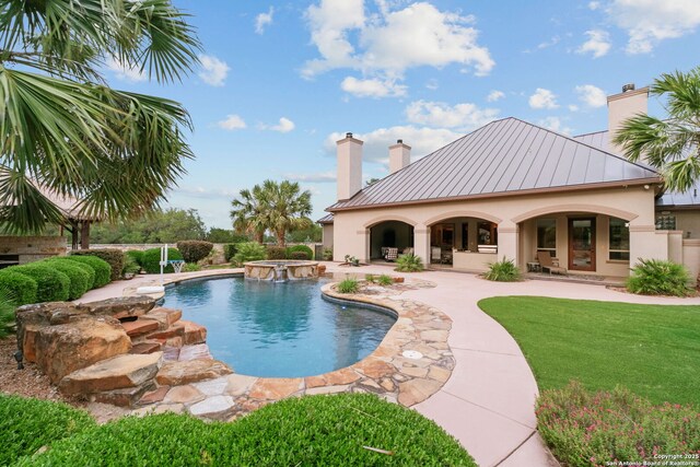 208 Cascade Caverns, Boerne, TX 78015 - view of swimming pool with a patio, a pool with connected hot tub, and a yard