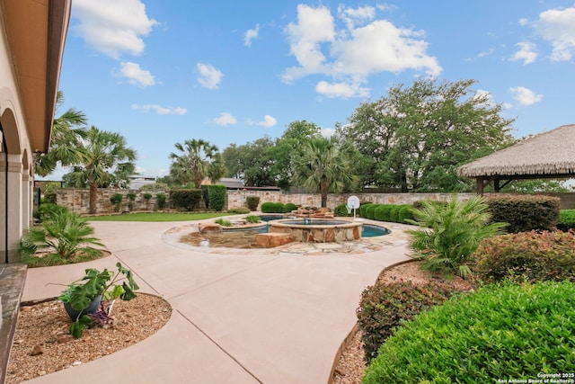 208 Cascade Caverns, Boerne, TX 78015 - surrounding community featuring a patio and a hot tub