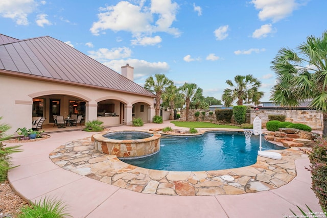 208 Cascade Caverns, Boerne, TX 78015 - view of pool featuring a patio area and a pool with connected hot tub