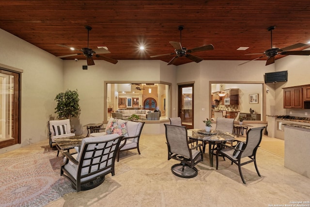 208 Cascade Caverns, Boerne, TX 78015 - view of patio / terrace with a ceiling fan, an outdoor kitchen, outdoor dining space, and an outdoor hangout area