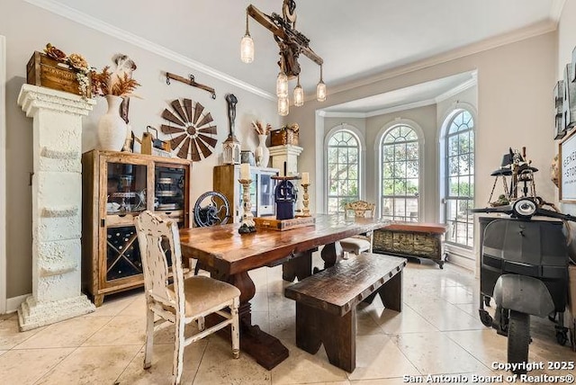 41 Champions Run, San Antonio, TX 78258 - dining space featuring crown molding and light tile patterned floors