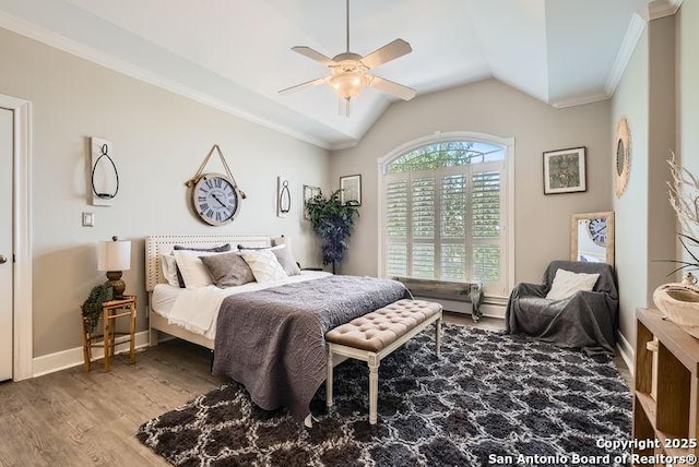 41 Champions Run, San Antonio, TX 78258 - bedroom featuring crown molding, wood finished floors, lofted ceiling, baseboards, and ceiling fan