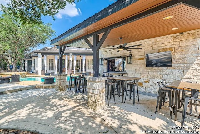41 Champions Run, San Antonio, TX 78258 - view of patio with ceiling fan, an outdoor pool, and a jacuzzi