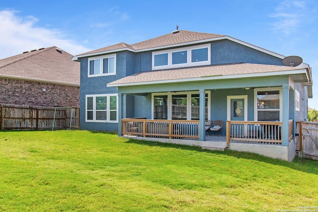 12815 Fort Belknap, San Antonio, TX 78245 - rear view of property with stucco siding and roof with shingles