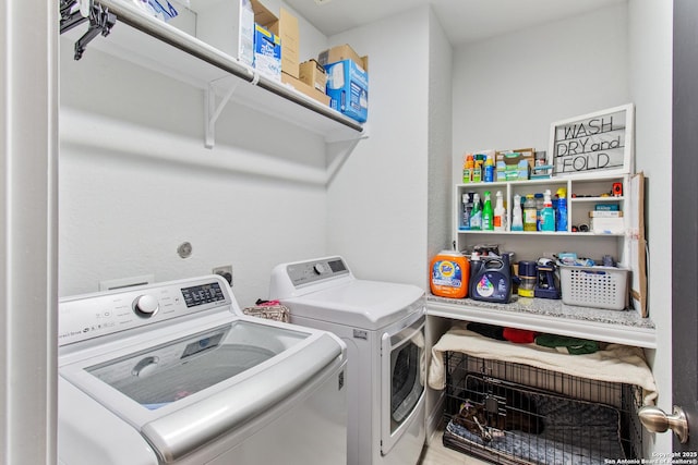 12815 Fort Belknap, San Antonio, TX 78245 - laundry room featuring washing machine and dryer