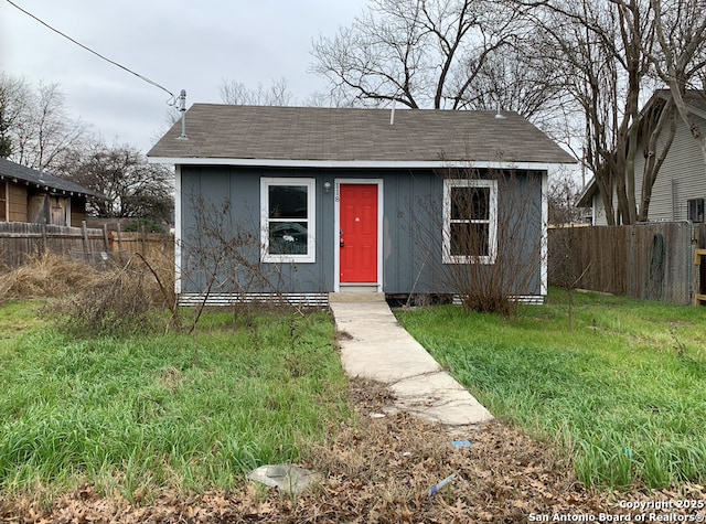 118 Tampa, San Antonio, TX 78211 - view of front facade featuring roof with shingles