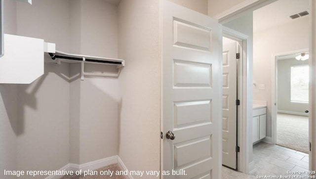 21055 Millstream Bnd, San Antonio, TX 78266 - spacious closet featuring light colored carpet