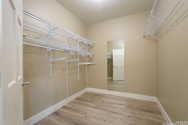 25927 Echo Mtn, San Antonio, TX 78260 - spacious closet with wood finished floors
