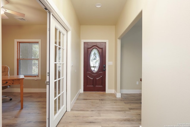 25927 Echo Mtn, San Antonio, TX 78260 - entryway with light wood finished floors, ceiling fan, and baseboards