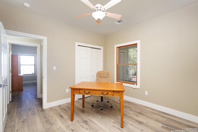 25927 Echo Mtn, San Antonio, TX 78260 - home office featuring baseboards, light wood-style flooring, and a ceiling fan