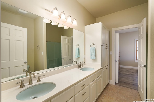 25927 Echo Mtn, San Antonio, TX 78260 - full bathroom featuring double vanity, tile patterned flooring, and baseboards