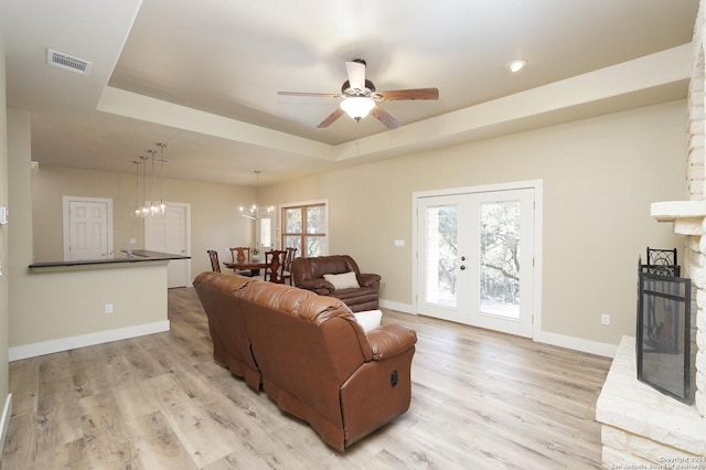 25927 Echo Mtn, San Antonio, TX 78260 - living area with a tray ceiling, ceiling fan, baseboards, light wood-style floors, and recessed lighting