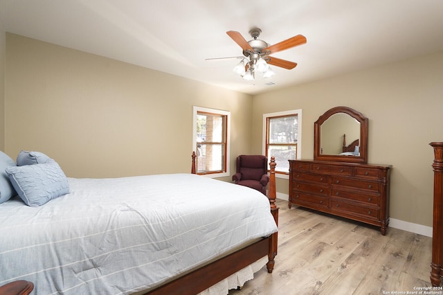 25927 Echo Mtn, San Antonio, TX 78260 - bedroom featuring light wood-type flooring, baseboards, and a ceiling fan