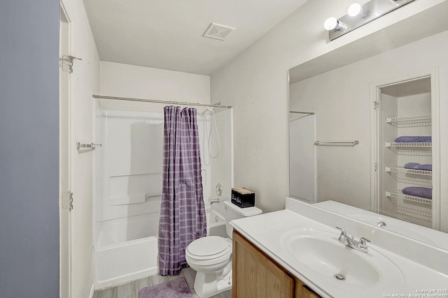 8810 Pensive, Converse, TX 78109 - full bathroom featuring toilet, shower / bath combo, vanity, and wood finished floors