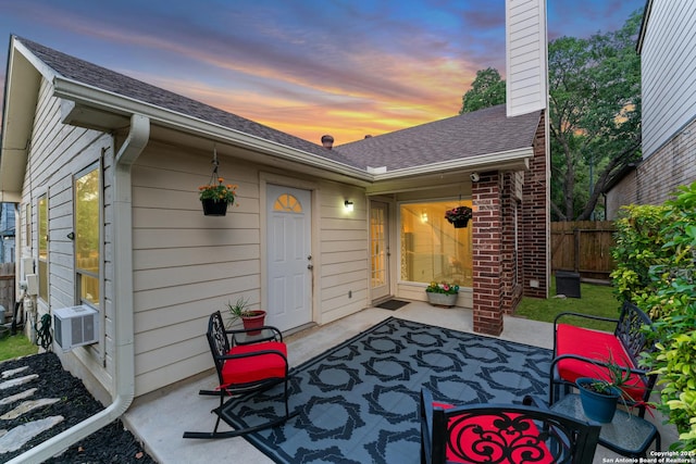 6431 Brookway, San Antonio, TX 78240 - patio terrace at dusk featuring a patio and cooling unit