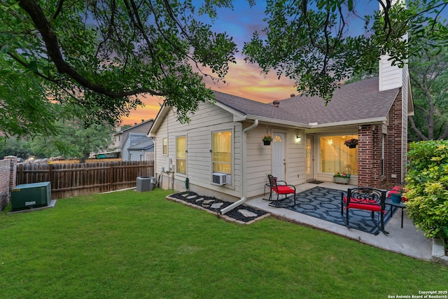 6431 Brookway, San Antonio, TX 78240 - back of property featuring a patio area, cooling unit, a chimney, central AC, and roof with shingles