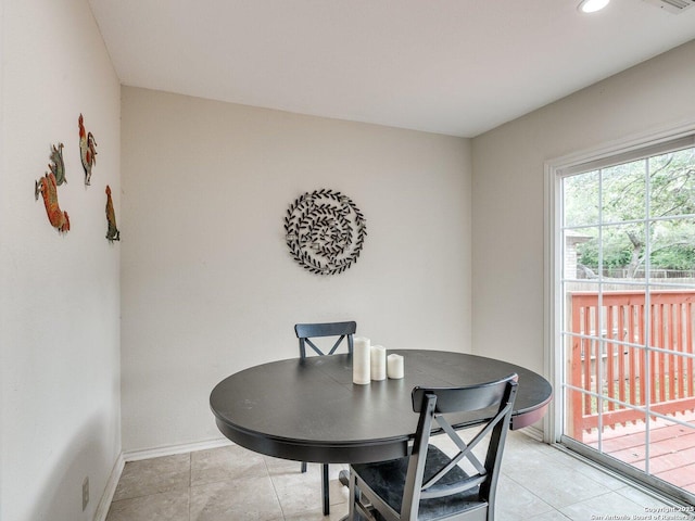 9427 Wildstone, San Antonio, TX 78254 - dining space with light tile patterned floors, baseboards, and recessed lighting