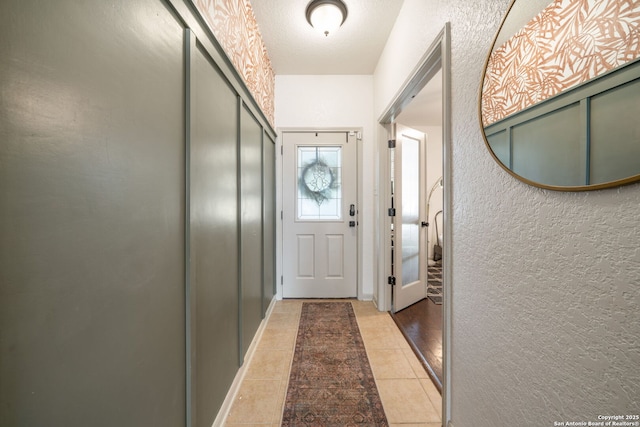 10228 Ancient Anchor, San Antonio, TX 78245 - entryway featuring a textured wall and light tile patterned floors