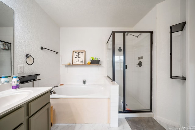 10228 Ancient Anchor, San Antonio, TX 78245 - full bathroom featuring a textured wall, a garden tub, vanity, a shower stall, and a textured ceiling