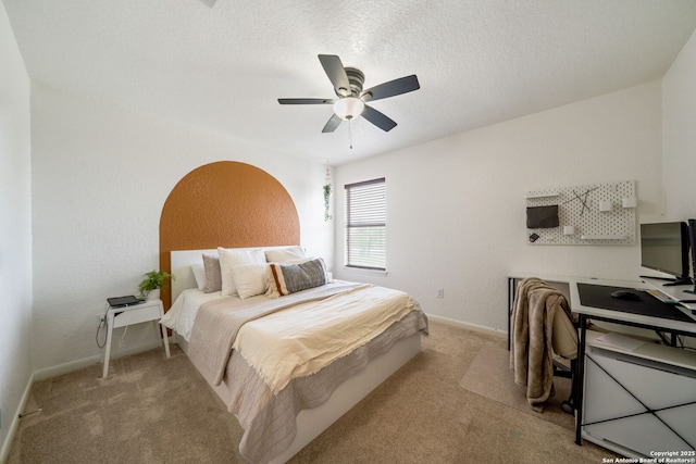 10228 Ancient Anchor, San Antonio, TX 78245 - carpeted bedroom featuring baseboards, a ceiling fan, a desk, and a textured ceiling