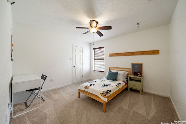 10228 Ancient Anchor, San Antonio, TX 78245 - bedroom featuring carpet, baseboards, ceiling fan, and a textured ceiling