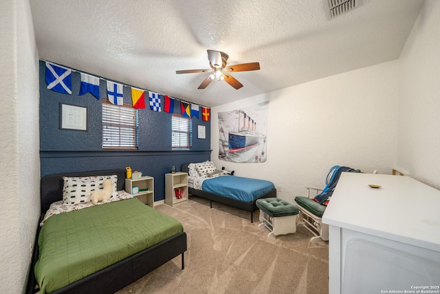 10228 Ancient Anchor, San Antonio, TX 78245 - carpeted bedroom featuring a ceiling fan and a textured ceiling