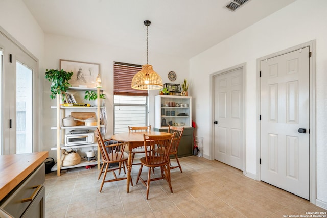 10228 Ancient Anchor, San Antonio, TX 78245 - dining area with light tile patterned floors