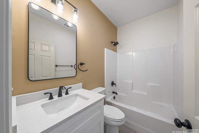 712 Gilmer, Kerrville, TX 78028 - full bathroom featuring toilet, vanity, and shower / bathtub combination