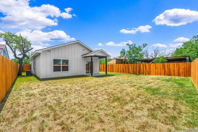 712 Gilmer, Kerrville, TX 78028 - back of property with board and batten siding and cooling unit