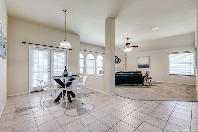 2710 Trinity Rdg, San Antonio, TX 78261 - dining space featuring light carpet, light tile patterned floors, baseboards, and a ceiling fan