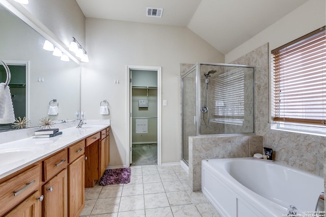 2710 Trinity Rdg, San Antonio, TX 78261 - bathroom with a stall shower, double vanity, a bath, lofted ceiling, and a spacious closet