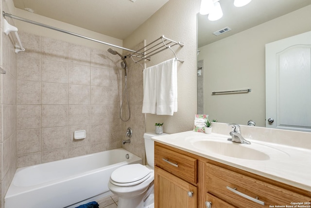 2710 Trinity Rdg, San Antonio, TX 78261 - bathroom featuring vanity, tub / shower combination, toilet, and tile patterned flooring