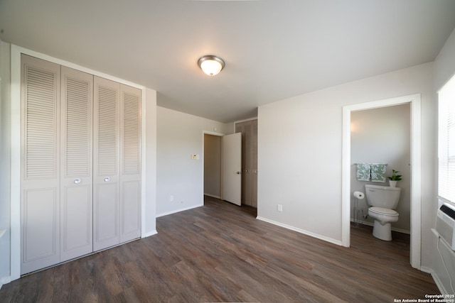7414 Westfield Blvd, San Antonio, TX 78227 - unfurnished bedroom with dark wood finished floors, baseboards, ensuite bath, and a closet