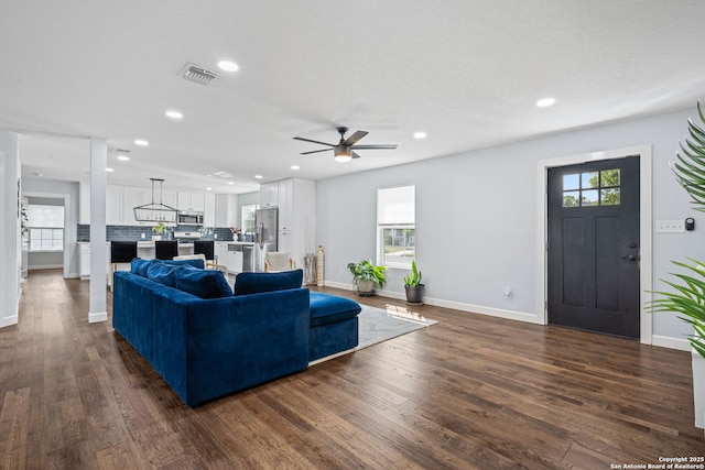 108 Bryn Mawr Dr, San Antonio, TX 78209 - living area with a ceiling fan, baseboards, dark wood-style flooring, and recessed lighting