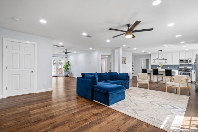 108 Bryn Mawr Dr, San Antonio, TX 78209 - living area featuring ceiling fan, dark wood finished floors, recessed lighting, and baseboards