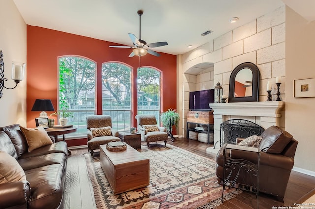28 Cutter Grn, San Antonio, TX 78248 - living room with ceiling fan, hardwood / wood-style floors, a fireplace, and baseboards