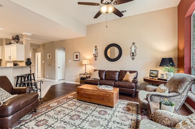 28 Cutter Grn, San Antonio, TX 78248 - living area with ceiling fan, arched walkways, wood finished floors, and baseboards