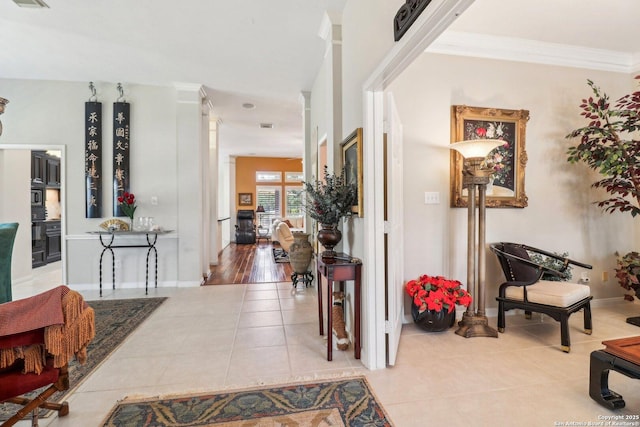8611 Torry Vw, Houston, TX 77095 - entryway with light tile patterned floors, baseboards, and crown molding