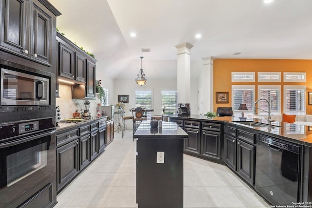 8611 Torry Vw, Houston, TX 77095 - kitchen with black appliances, a sink, a center island, backsplash, and dark cabinets