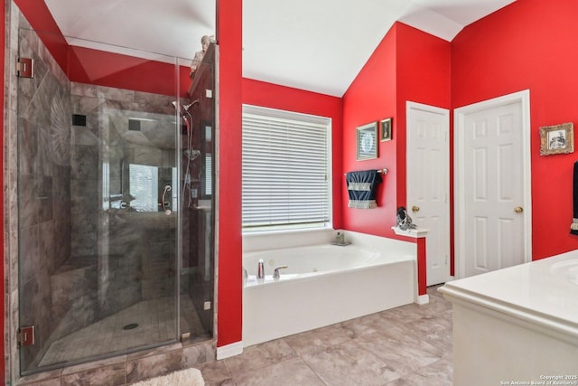 8611 Torry Vw, Houston, TX 77095 - bathroom with a garden tub, vanity, a stall shower, and baseboards