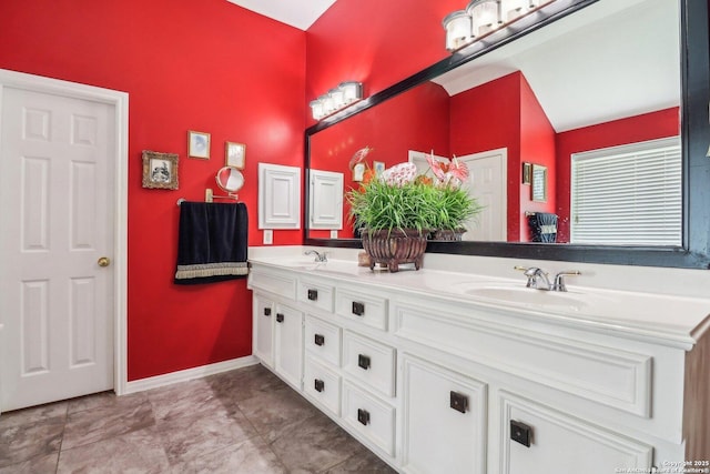 8611 Torry Vw, Houston, TX 77095 - bathroom with double vanity and baseboards