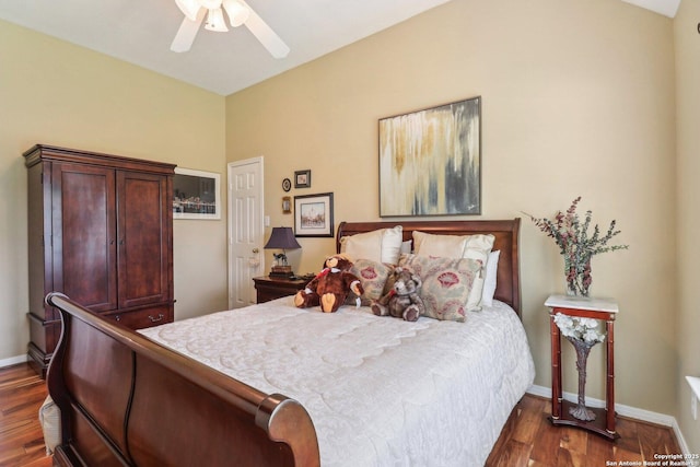 8611 Torry Vw, Houston, TX 77095 - bedroom with dark wood-style flooring, baseboards, and a ceiling fan