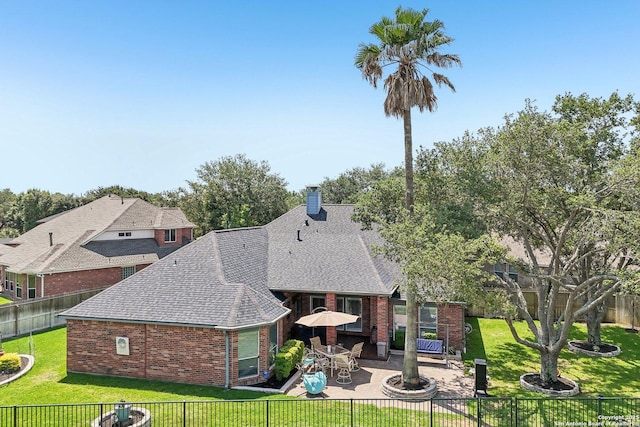 8611 Torry Vw, Houston, TX 77095 - rear view of house with brick siding, a patio, a shingled roof, and a chimney