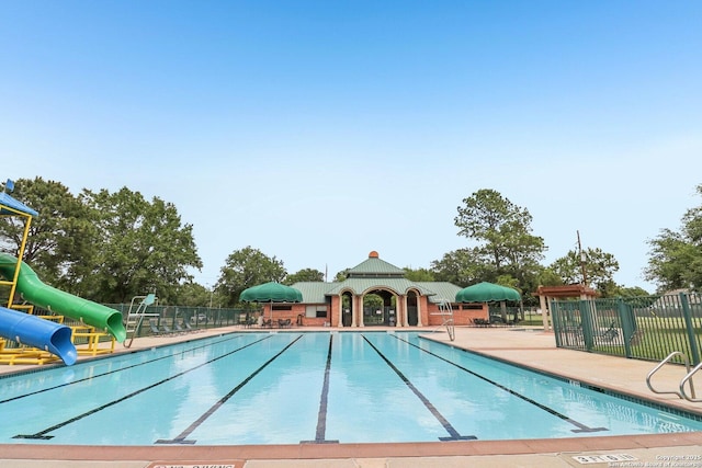 8611 Torry Vw, Houston, TX 77095 - community pool with a water slide and a patio area